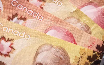 El dólar canadiense cae a sus niveles más bajos en dos décadas por los aranceles de Trump